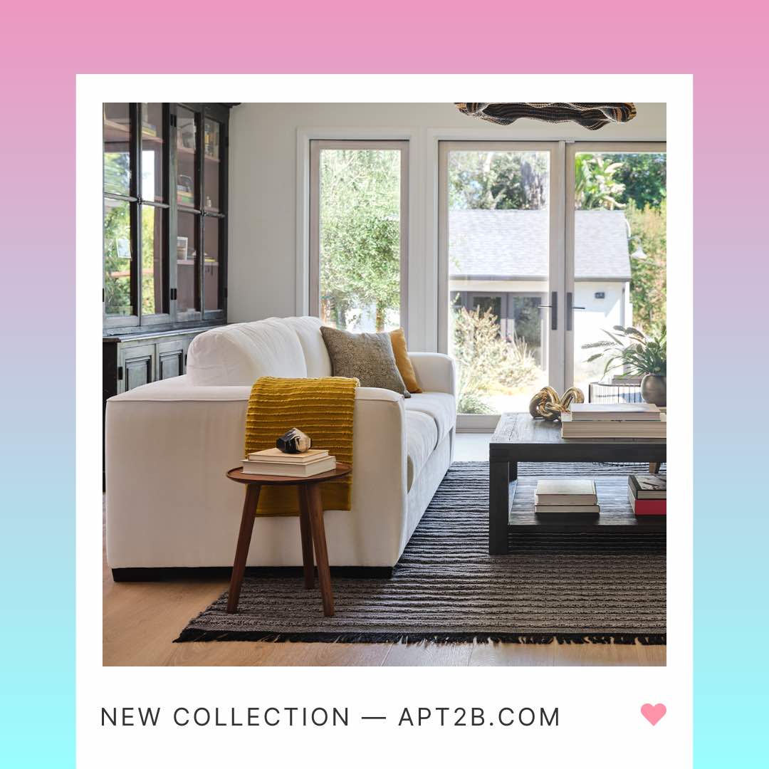 Apt2b white sofa and coffee table in the living room